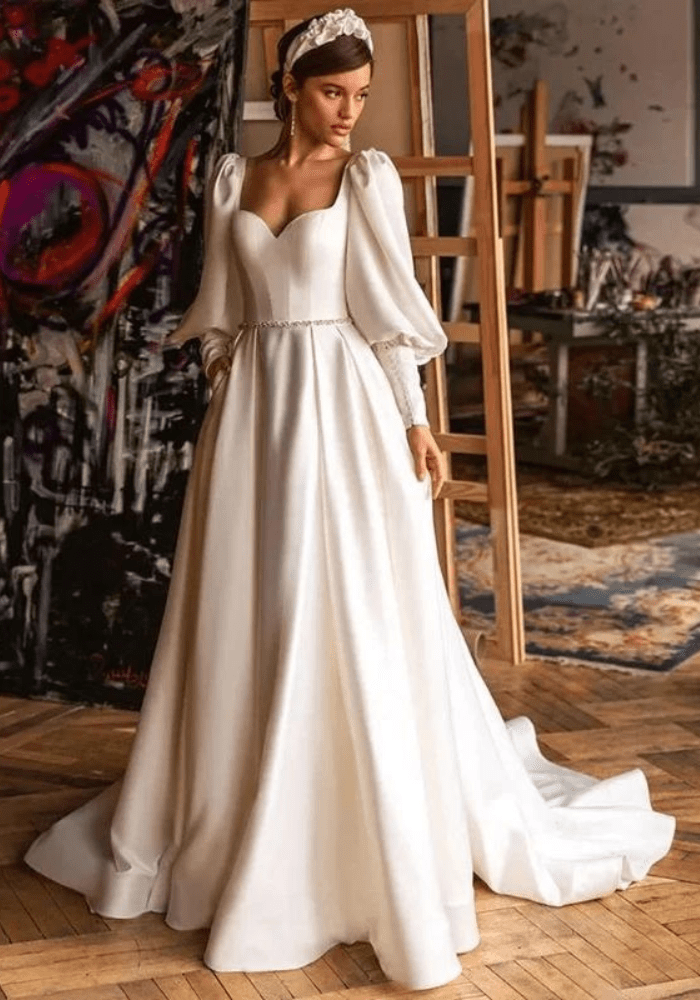 Robe de mariée trapèze manche longue bouffantes