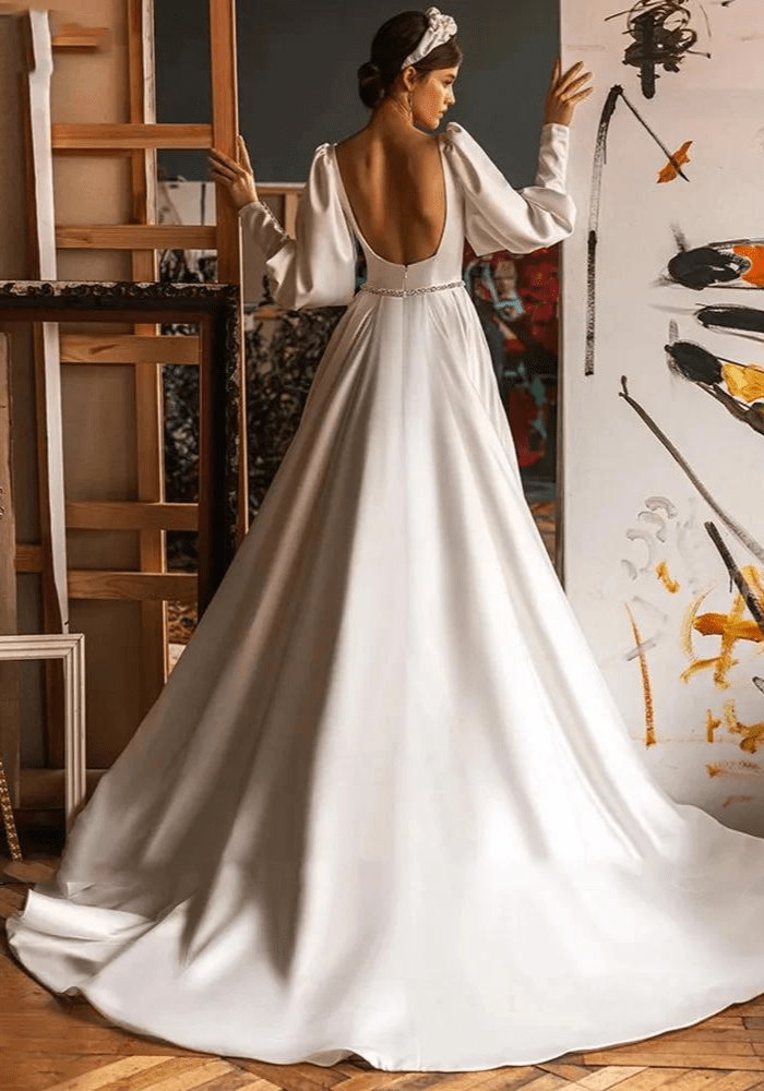 Robe de mariée trapèze manche longue bouffantes