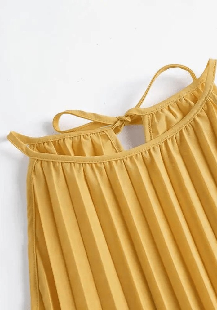 Robe trapèze jaune plissée